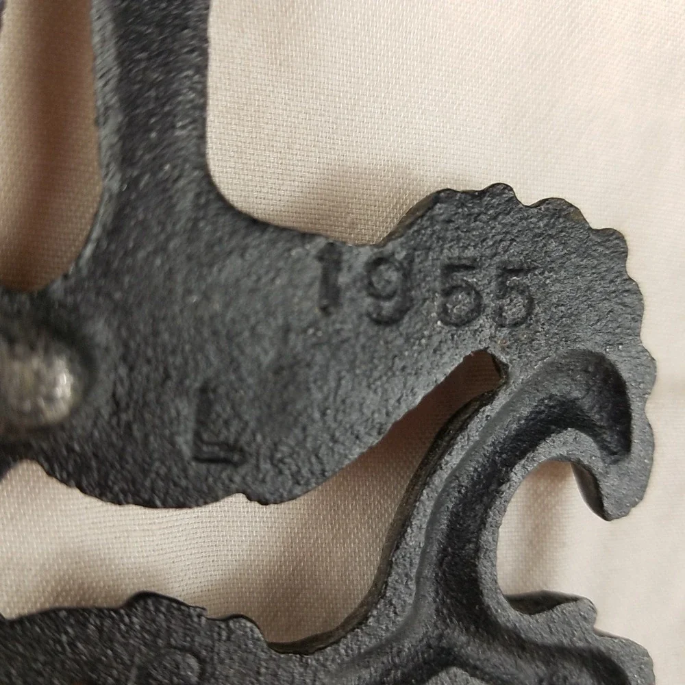 Vintage 1955 Cast Iron Trivet T-11 Cupid Sailor Cherub Black Metal Hot Plate 8.5